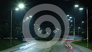 The movement of cars on the city road, car lights, time lapse