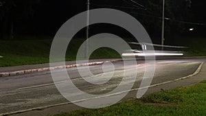 The movement of cars on the city road, car lights, time lapse
