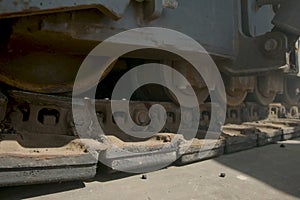 Movement of a caterpillar tractor. Equipment for paving of asphalt.