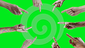 Movement of hands showing something in the center of the image. Multiple multicolored hand. Black, white green background for