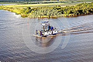 The movement of sea merchant ships and tugs to the entrance and exit from the port. Beaumont, Texas