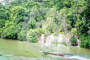 The movement of the ship. Sai Yok waterfall, the beautiful waterfall in forest at Sai Yok National Park