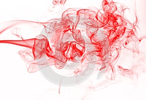 Movement of smoke abstract isolated on white background, red ink water