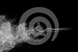 Movement of smoke on black background, smoke background,