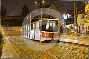 Movement of trams and pedestrians to nightlife Prague, Czech Republic