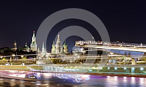 Movement of water and motor transport on the river and embankment near the Kremlin and Moscow river from Zaryadye urban