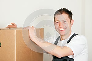 Mover with boxes in the course of relocation