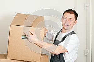 Mover with boxes in the course of relocation photo