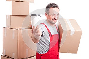 Mover man holding box and showing coffee