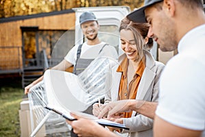 Movers delivering goods during a relocation