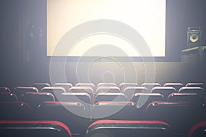 Movie Cinema hall with a white empty screen premiere with red seats