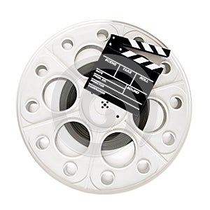 Movie clapper on 35 mm cinema film reel isolated