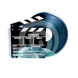 Movie clapper board and 35 mm film reel
