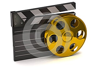 Movie clapper board and golden film reel photo