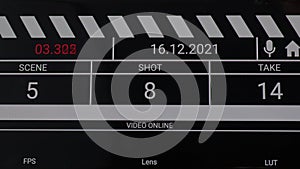 Movie clapper board interface. Digital number running and counting before shooting