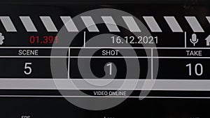 Movie clapper board interface. Digital number running and counting before shooting