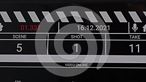 Movie clapper board interface. Digital number running and counting before shooting