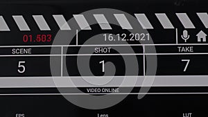 Movie clapper board interface. Digital number running and counting before shooting