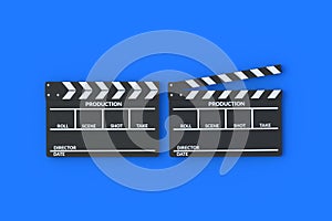 Movie clapper boards on blue background. Filmmaking accessories