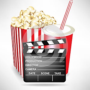 Movie clapper with popcorn and cola