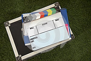 Movie clapperboard is on the box. Roll, scene, take, date, director, director and photography empty space