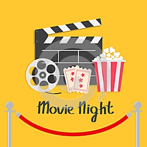 Movie night. Red rope barrier stanchions turnstile facecontrol Open clapper board reel Popcorn box Ticket Admit one. Three star. C