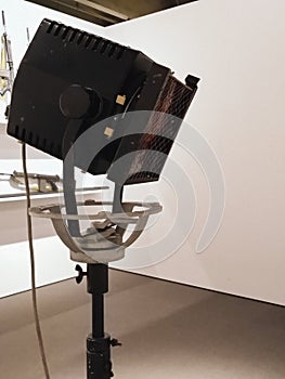 Movie projector on a dark background with light beam high contrast image