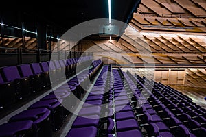 Movie Theater with empty seats and projector.