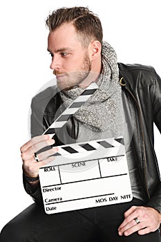 Movie worker sitting down in black jacket