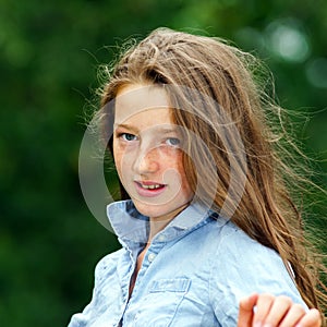 Moving into adulthood. Outdoor portrait of teenage girl.