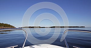 Moving boat in sunny summer weather.