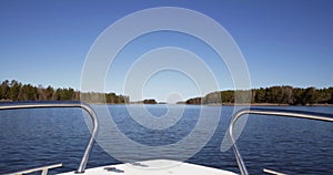 Moving boat in sunny summer weather.