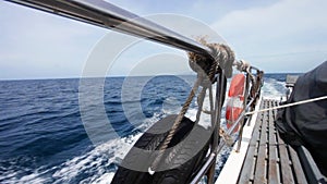 Moving boat in tropical sea.