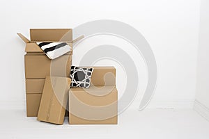 Moving boxes with blanket and pillow