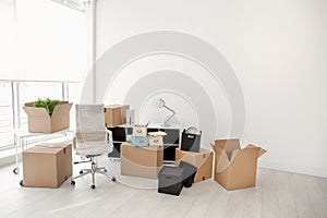 Moving boxes and furniture in office