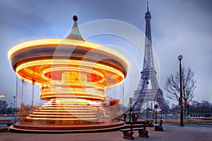 Moving carousel close to Eiffel Tower, Paris