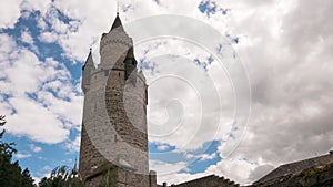 Moving clouds over the ancient tower of Friedberg