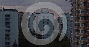 Moving clouds on sky above the roof in Troitsk city Timelapse