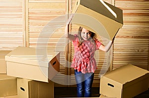 Moving day. purchase of new habitation. repair of room. new apartment. unpacking moving boxes. happy child cardboard box