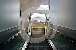 Moving escalator in the automatic stairs international airport