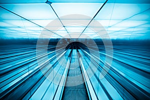 Moving escalator in modern building