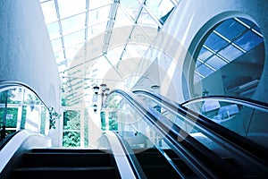 Moving escalator in modern office