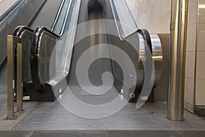 Moving escalator with people