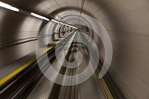 Moving fast through a modern, conrete tunnel