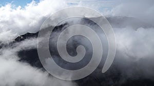 Moving fog clouds in the mountains of Horton Plains at Worlds End view point, Eliya Nuwara, Sri Lanka