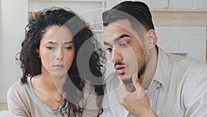 Moving footage ethnic spanish arab frustrated married couple feeling stressed about high mortgage receive letter notice