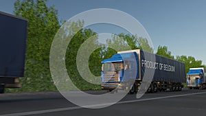 Moving freight semi trucks with PRODUCT OF BELGIUM caption on the trailer