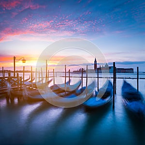 Moving gondola boats in harbor