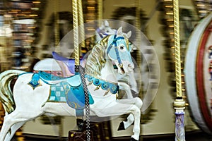 Moving horses on classic french carousel