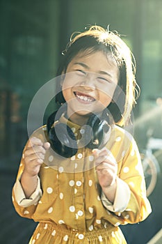 Moving motion of lovely asian children dancing with music rythm